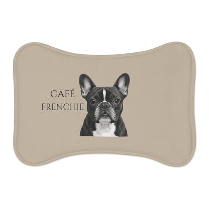 A bone-shaped beige pet feeding mat featuring a French Bulldog  and the text 'CAFÉ FRENCHIE'