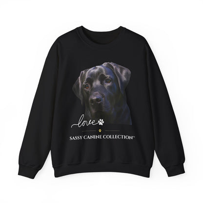 A black crewneck sweatshirt featuring a graphic print of a black Labrador Retriever's face, with the text 'Love' in script, a paw print, and 'SASSY CANINE COLLECTION' printed below.