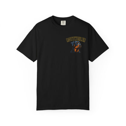 A black short-sleeve crewneck t-shirt featuring a graphic print of a Rottweiler dog and the word 'ROTTWEILER' in yellow on the left chest, displayed against a solid white background.
