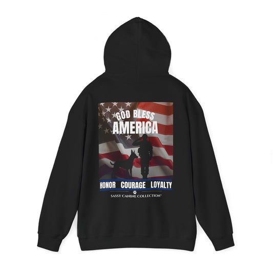 A black pullover hoodie shown from the back, featuring a large patriotic graphic print with an American flag, a soldier silhouette, a dog, and the text 'God Bless America' and 'Honor Courage Loyalty'.