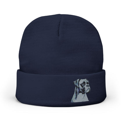  navy blue knit beanie hat with a folded cuff, featuring a light blue and white embroidered  Boxer