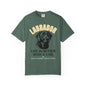 A dark green short-sleeve t-shirt with a graphic print of a Labrador dog and the text 'LABRADOR LIFE IS BETTER WITH A LAB. SASSY CANINE COLLECTION' on a white background.