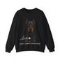 A black crewneck sweatshirt featuring a graphic print of a Doberman dog with the text 'love' and 'SASSY CANINE COLLECTION' on a white background.