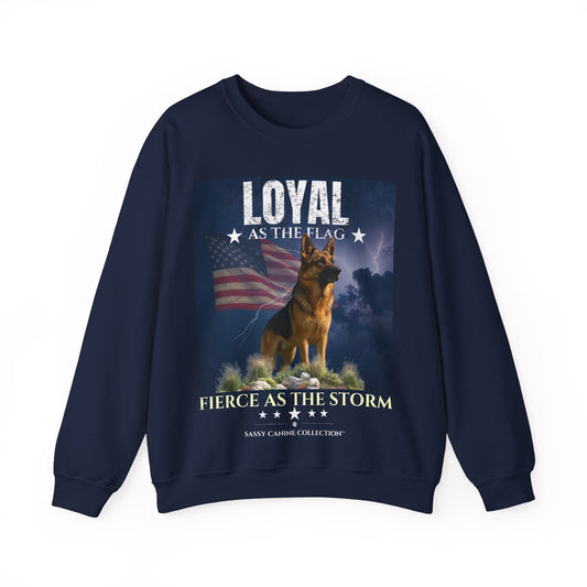 A navy blue crewneck sweatshirt featuring a patriotic German Shepherd graphic with the text 'LOYAL AS THE FLAG' and 'FIERCE AS THE STORM' on a white background.