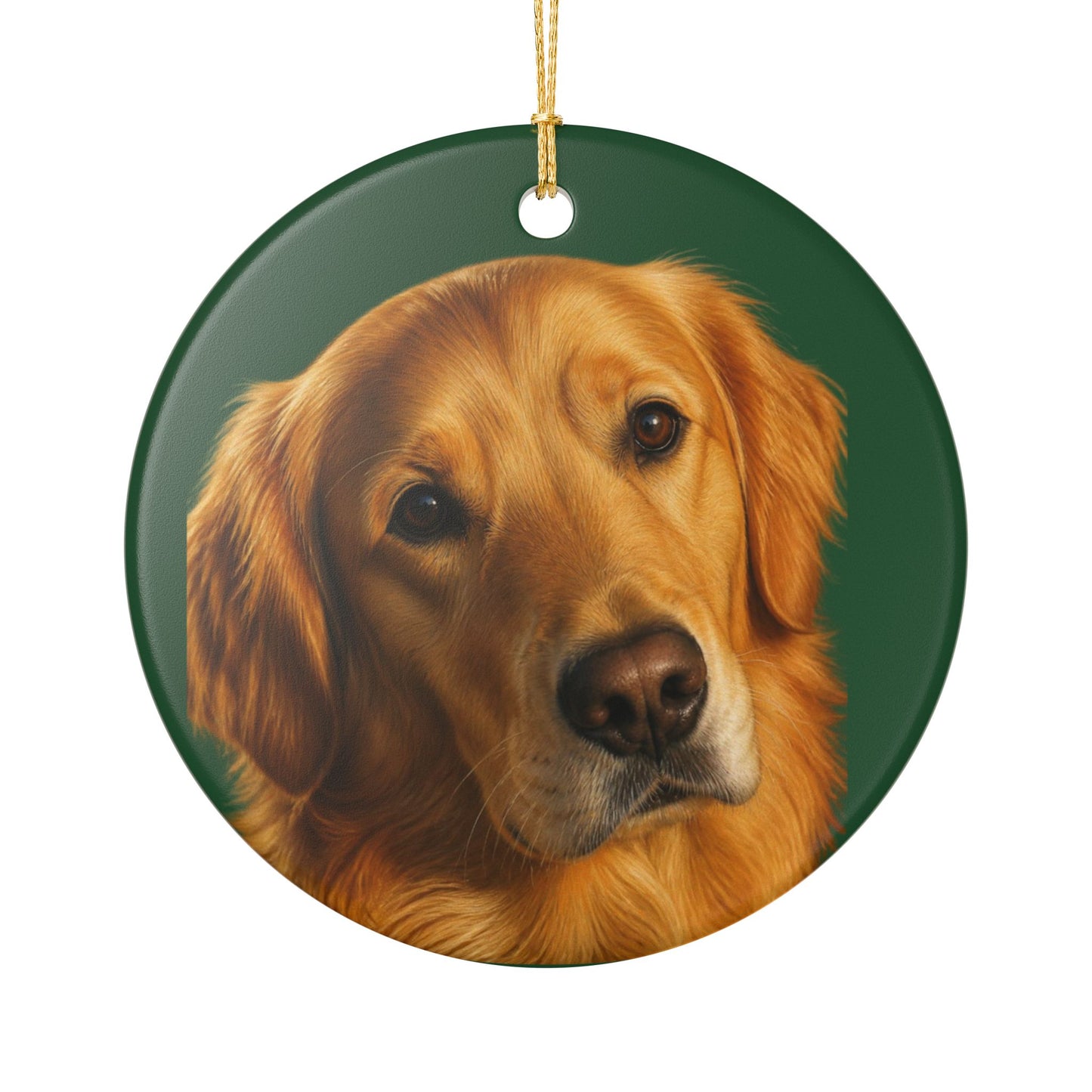 A round ceramic Christmas ornament featuring a painted portrait of a golden retriever on a dark green background
