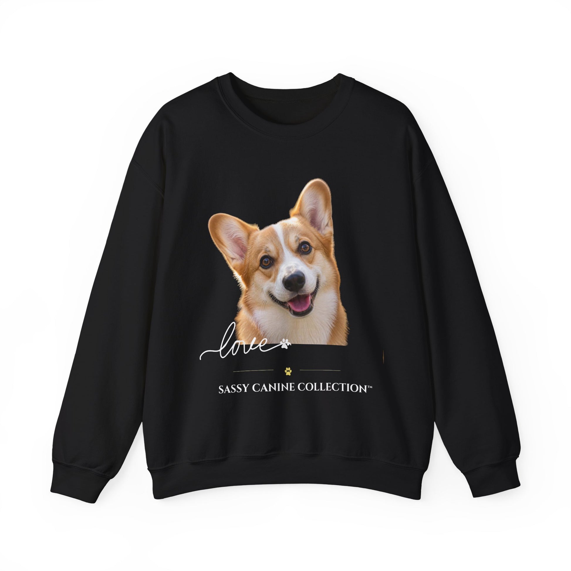 A black crewneck sweatshirt featuring a graphic print of a smiling Corgi dog with the text 'Love' and 'SASSY CANINE COLLECTION' on the front, displayed against a solid white background.