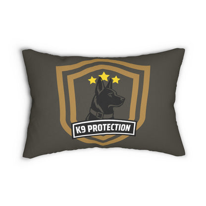 A dark gray throw pillow featuring a large a German Shepherd inside a gold shield with three stars and a banner reading 'K9 PROTECTION'.