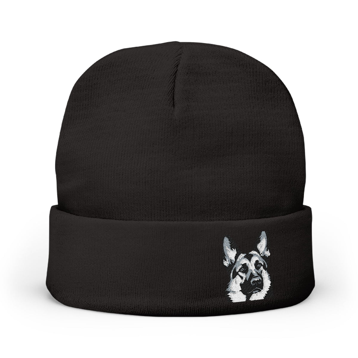 A black knit beanie hat with a folded cuff, featuring a German Shepherd 