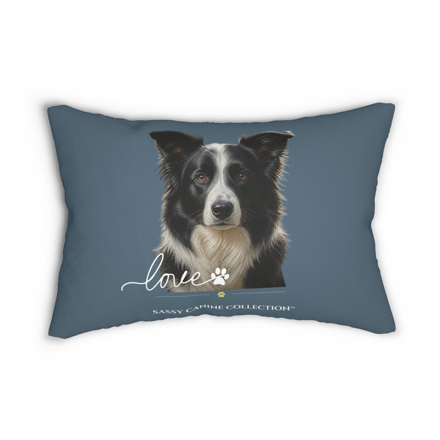 A  decorative lumbar pillow in slate blue with a printed portrait of a black and white dog and the text 'love' and 'Sassy Camille Collection' on the front.