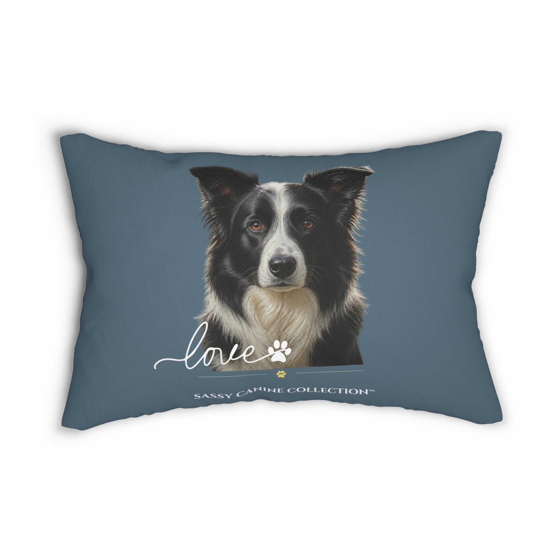 A  decorative lumbar pillow in slate blue with a printed portrait of a black and white dog and the text 'love' and 'Sassy Camille Collection' on the front.