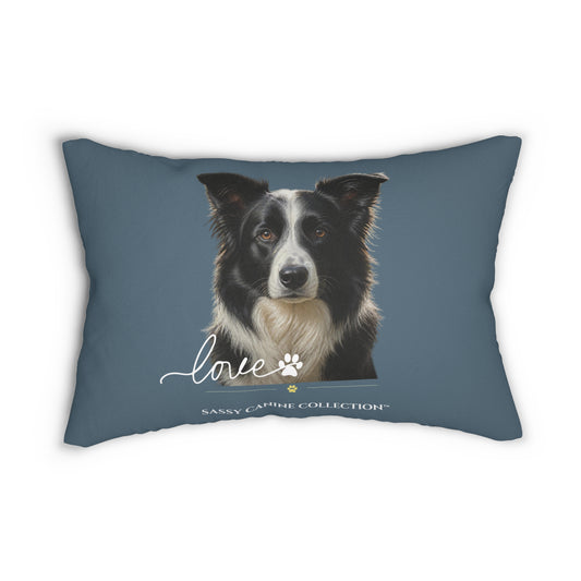 A  decorative lumbar pillow in slate blue with a printed portrait of a black and white dog and the text 'love' and 'Sassy Camille Collection' on the front.