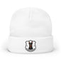 A white knit cuffed beanie hat featuring a printed Doberman dog crest logo on the front cuff.