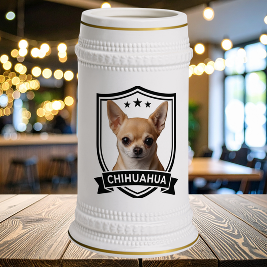 A white ceramic beer stein with gold trim featuring a portrait of a Chihuahua dog inside a black shield outline with the word 'CHIHUAHUA' on a banner